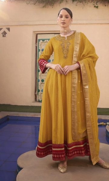 IVORY TISSUE ANARKALI SET WITH BLACK COLOR BLOCKINGDETAIL ON SLEEV AND GHERA